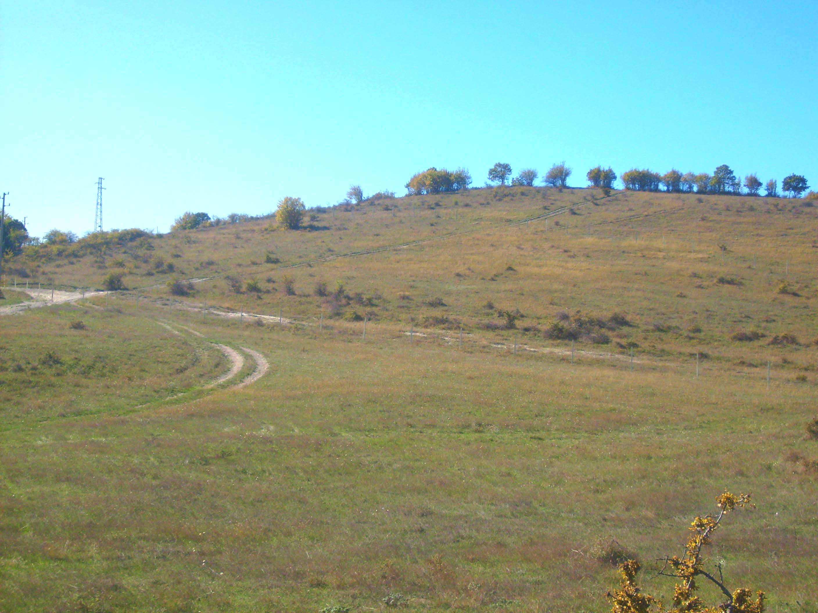 The land is sloping slightly and is located at the highest point of Osenovo.